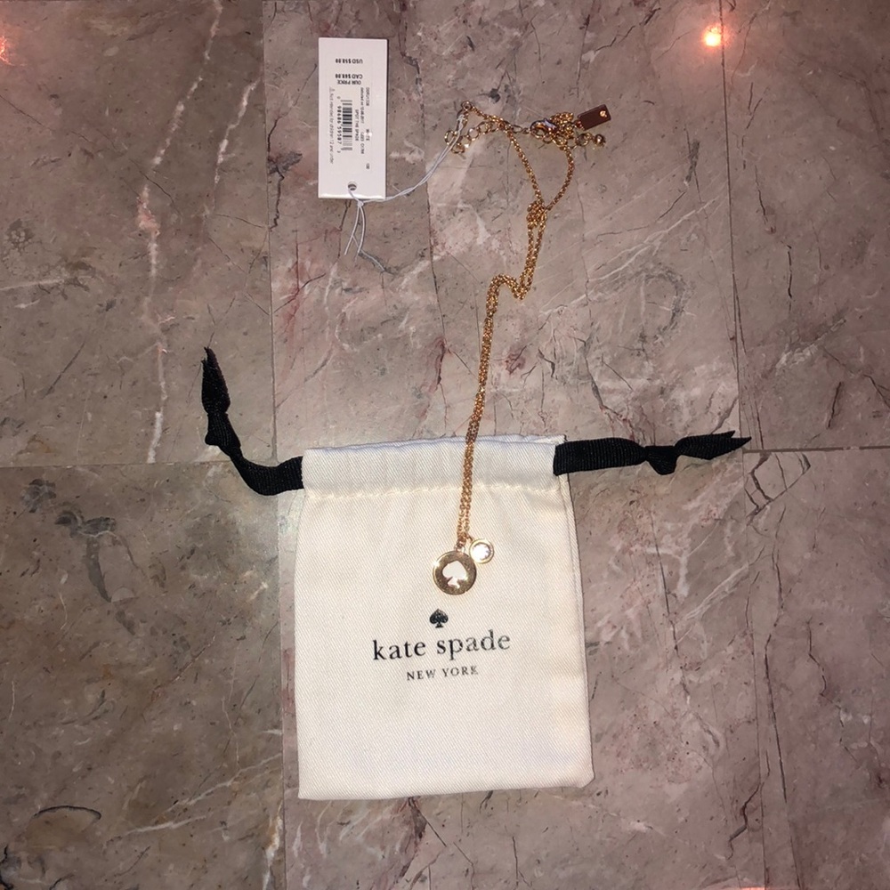 Kate spade gold necklace.